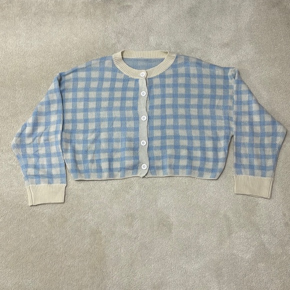 NWOT Shein Curve Baby Blue and Cream
Gingham Knit drop shoulder cardigan. - Picture 2 of 10
